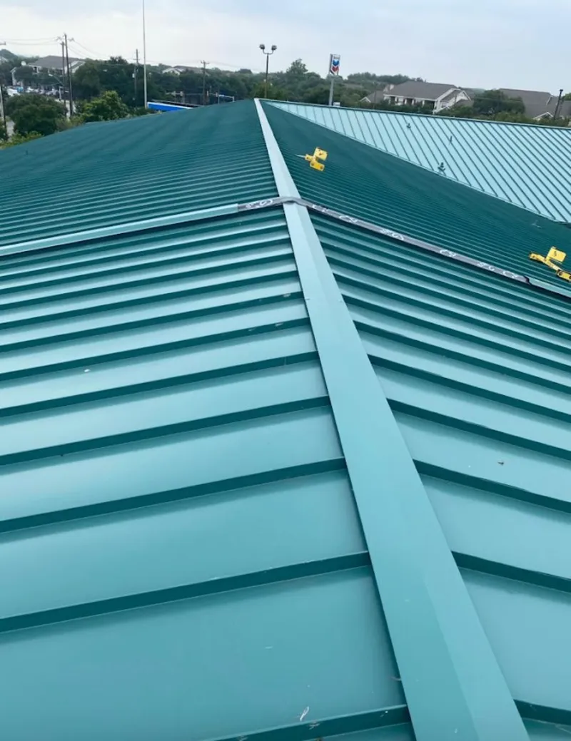 Green commercial metal roof ridge and valley for Metal Roof Repair in Ben Lomond