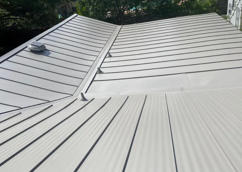 Solar attic fan installed on a metal roof for Roof Ventilation in Ben Lomond